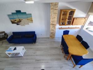 A seating area at Townhouse with bbq and pools - Costa Hispania
