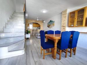 A seating area at Townhouse with bbq and pools - Costa Hispania