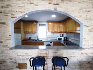 A kitchen or kitchenette at Townhouse with bbq and pools - Costa Hispania