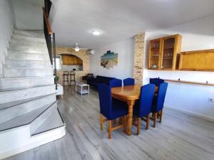 A kitchen or kitchenette at Townhouse with bbq and pools - Costa Hispania