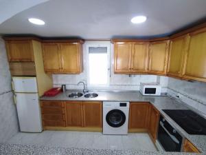 A kitchen or kitchenette at Townhouse with bbq and pools - Costa Hispania