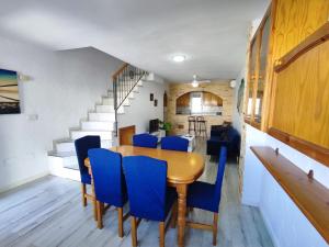 A seating area at Townhouse with bbq and pools - Costa Hispania