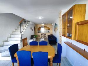 A seating area at Townhouse with bbq and pools - Costa Hispania