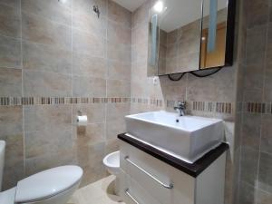 Koupelna v ubytování ACV - Costa Azahar II-2ª linea, planta 6, sur