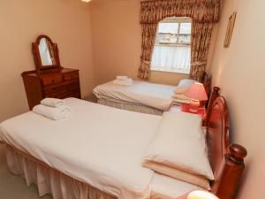 Postel nebo postele na pokoji v ubytování Ivy Cottage + 36 fotografií