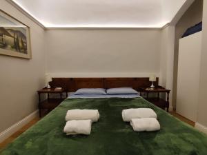 Posteľ alebo postele v izbe v ubytovaní BORGO SAN FREDIANO SUITES