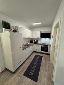 Kuchyň nebo kuchyňský kout v ubytování Ferienwohnung Bachmann