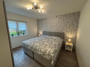 Postel nebo postele na pokoji v ubytování Ferienwohnung Bachmann