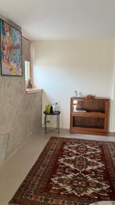 Posezení v ubytování Chambre d'hôtes avec salle de bain privée chez Martine + 10 fotografií