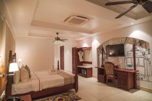 Postel nebo postele na pokoji v ubytování Resort Titli + 56 fotografií