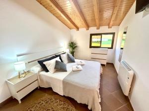 Posteľ alebo postele v izbe v ubytovaní CASA O PIÑEIRO + 24 fotografií