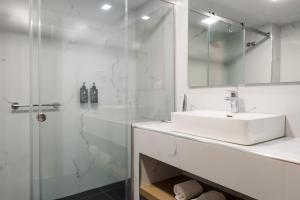 Koupelna v ubytování Palatino Hotel