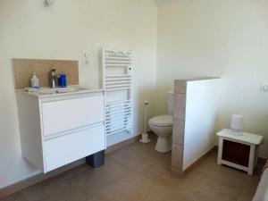 a bathroom with a sink and a toilet at Javeline Saint Hilaire de Riez in Sion-sur-lʼOcéan +7 photos