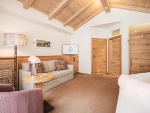 Postel nebo postele na pokoji v ubytování Hotel Magdalena Mayrhofen