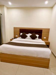 Voodi või voodid majutusasutuse The Reo Lodge, Haridwar toas