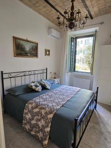 Letto o letti in una camera di Testaccio Charme Apt