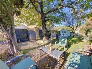 Κήπος έξω από το Maison sommet village avec jardin jacuzzi vue