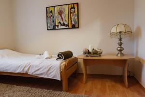 Postel nebo postele na pokoji v ubytování Apartman Vuk