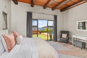 Ένα ή περισσότερα κρεβάτια σε δωμάτιο στο 3-Bedroom Dream Escape - Knysna +27 φωτογραφίες