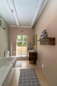 Ένα μπάνιο στο 3-Bedroom Dream Escape - Knysna