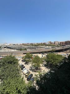 a group of cars parked in a parking lot at Paradise Home in Valencia