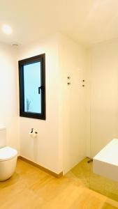 Hostal Es Niu de Tamariu客房内的一张或多张床位