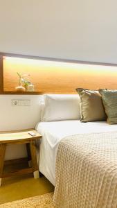 Hostal Es Niu de Tamariu客房内的一张或多张床位