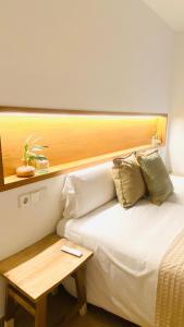 Hostal Es Niu de Tamariu客房内的一张或多张床位