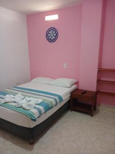 Letto o letti in una camera di Hotel Lagos de Guatape