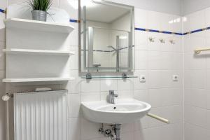 Koupelna v ubytování Likedeeler Wohnung 01 + 28 fotografií