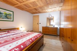 Postel nebo postele na pokoji v ubytování Taverna Larice