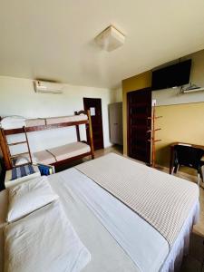 Postel nebo postele na pokoji v ubytování Pousada Bossa Nova