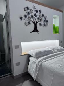 Postel nebo postele na pokoji v ubytování MA PI B&B Room Boutique