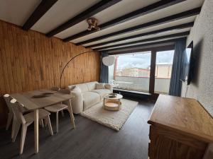 TV a/nebo společenská místnost v ubytování Résidence Les Gémeaux-4pers-Alpe d'Huez-Pied des pistes + 1 fotografie