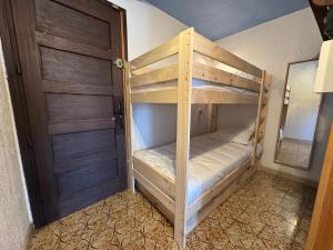 Postel nebo postele na pokoji v ubytování Résidence Les Gémeaux-4pers-Alpe d'Huez-Pied des pistes