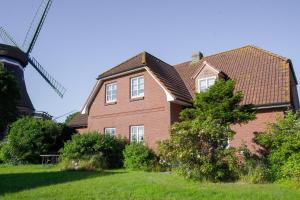 Κήπος έξω από το Himmelreich - Helle & moderne Ferienwohnung am Meer