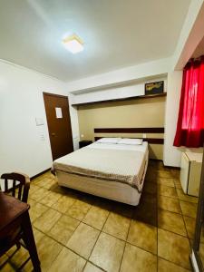 Postel nebo postele na pokoji v ubytování Pousada Bossa Nova