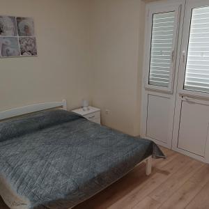 Posteľ alebo postele v izbe v ubytovaní Rooms Kvestic