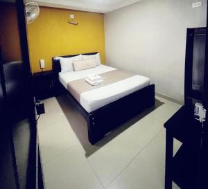 Uma cama ou camas num quarto em Hotel Chico Real