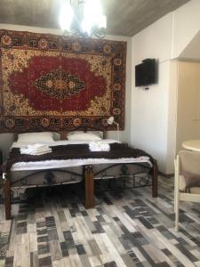 TV a/nebo společenská místnost v ubytování Verona Apartment + 37 fotografií