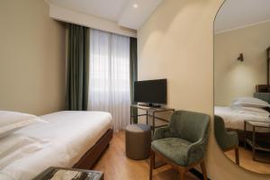 A television and/or entertainment centre at Hotel Mozart