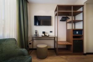 A television and/or entertainment centre at Hotel Mozart