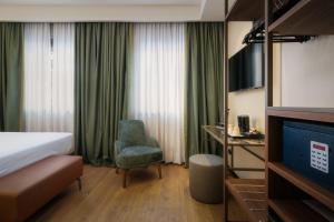 A television and/or entertainment centre at Hotel Mozart