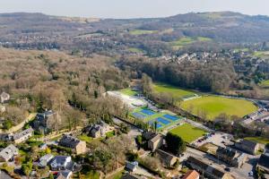 an aerial view of a town with a tennis court at Holme Valley View in Holmfirth +20 photos