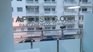 a sign on the side of a building at APCOSTAS Els Pins Lotus in Blanes