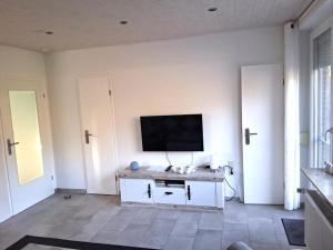 Et tv og/eller underholdning på NEU! Ferienhaus Elisa an der Nordsee