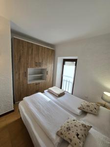 Postel nebo postele na pokoji v ubytování bb26 apartment mountain Lozio