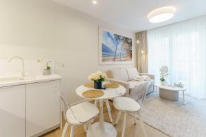 Posezení v ubytování Apartament Młyńska 10