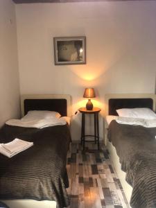 Postel nebo postele na pokoji v ubytování Verona Apartment