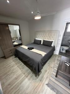 Postel nebo postele na pokoji v ubytování Skypool Guesthouse